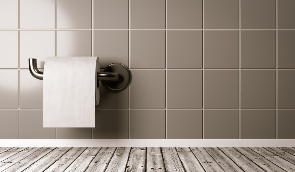 Comment coller un porte-papier toilette ?